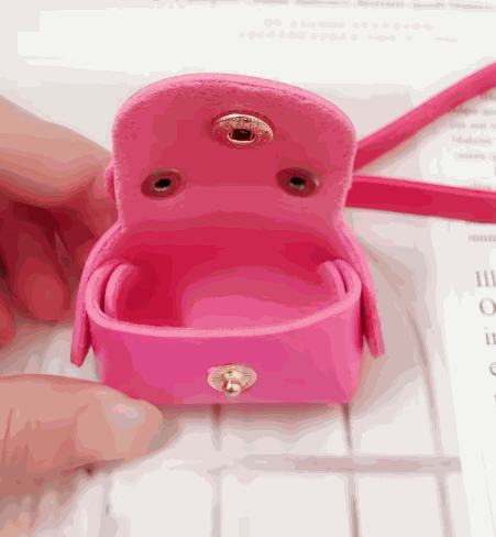 Mini coin purse keychain with gold ring and snap clasp in assorted colors, faux leather finish