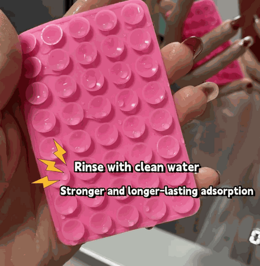 Suction cup phone gripper double-sided silicone pad in assorted colors for secure, residue-free phone mounting
