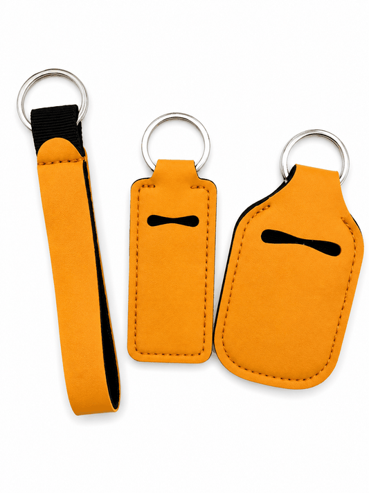 Standard solid hand sanitizer keychain set with soft fabric holder, refillable bottle, and matching wrist strap