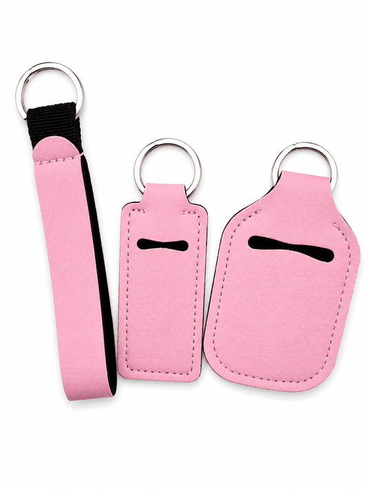 Standard solid hand sanitizer keychain set with refillable bottle, soft fabric holder, and matching wrist strap