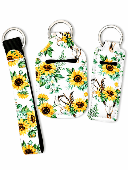 Gloss case, sanitizer holder, and wristlet keychain set with stylish prints and free bottle