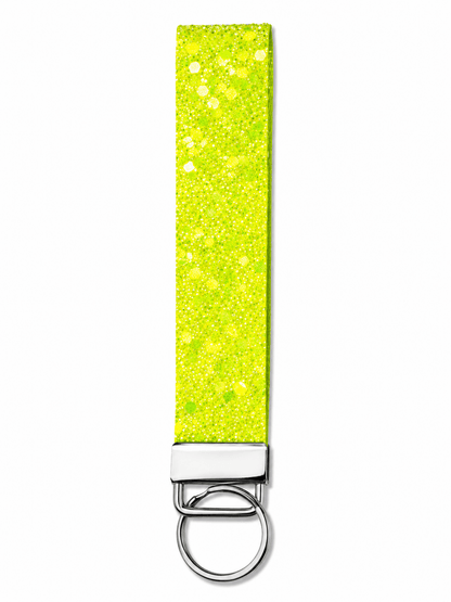 White printed wrist strap keychain with colorful playful patterns and metal clasp
