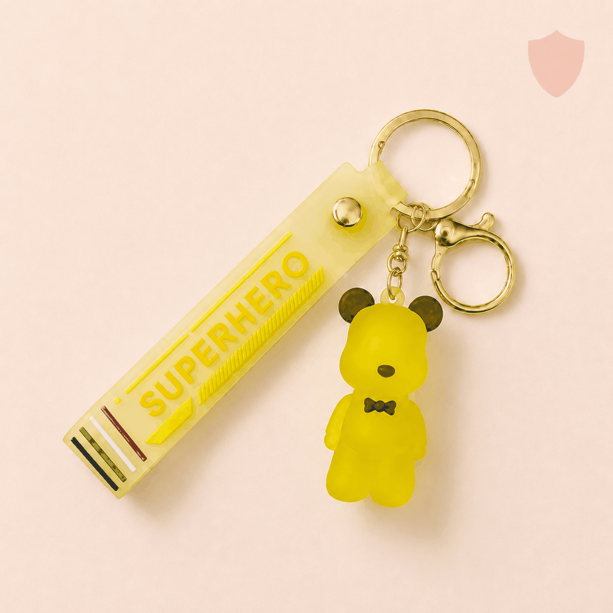 S&S superhero bear keychain with matte rubber texture and gold clasp