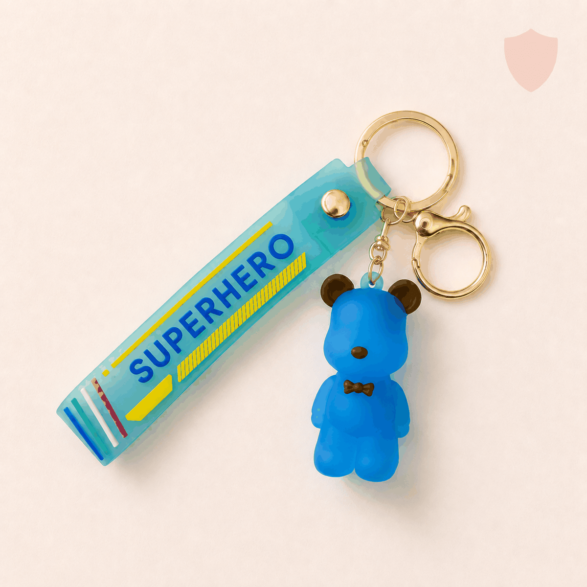 matte rubber superhero bear keychain with gold-tone clasp